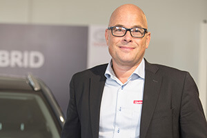 Bild på en glad man.